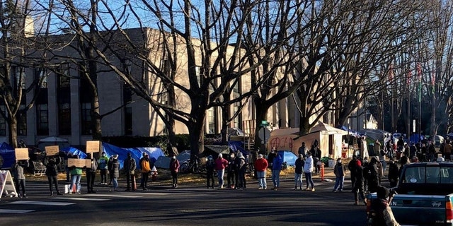 This undated photo shows protesters outside Bellingham Town Hall, where a homeless camp has taken root. 