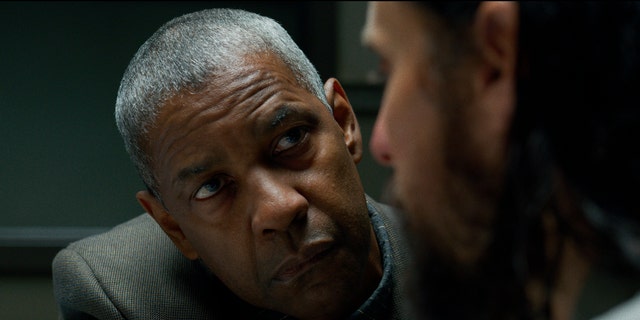 This image released by Warner Bros. Pictures shows Denzel Washington and Jared Leto in a scene from "The small things."