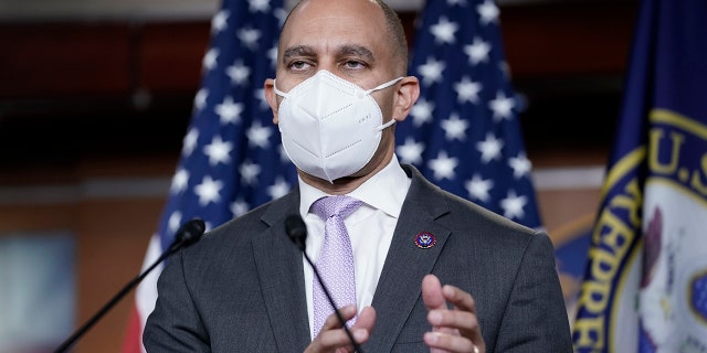 House Democratic Caucus Chair Hakeem Jeffries, D-N.Y., meets with reporters following a conference call with fellow Democrats at the Capitol in Washington on Jan. 4, 2021. (AP Photo/J. Scott Applewhite)