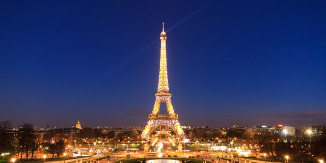 Paris, France - February 21, 2014: The Eiffel tower at night seen from the Trocadero square in Paris, France, at February 21, 2014