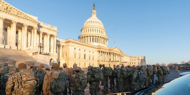 Members of the National Guard gather on Capitol Hill Jan.12.  Photo credit: Chris Kleponis / Sipa USA