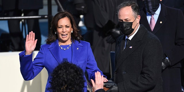 Kamala Harris was sworn in as vice president by Supreme Court Justice Sonia Sotomayor while her husband Doug Emhoff held the Bible. The 59th Presidential Inauguration took place at the U.S. Capitol on Jan. 20, 2021. (Saul Loeb/Pool Photo via AP)