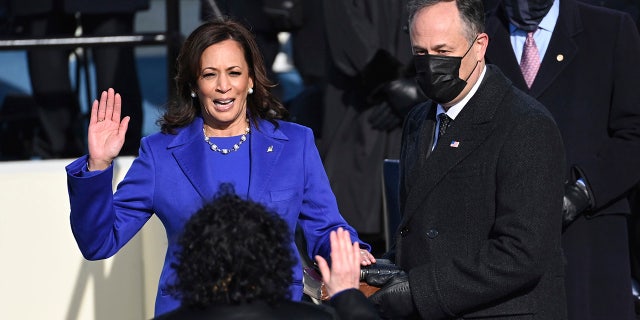 Kamala Harris was sworn in as vice president by Supreme Court Justice Sonia Sotomayor while her husband Doug Emhoff held the Bible. The 59th Presidential Inauguration took place at the U.S. Capitol on Jan. 20, 2021. (Saul Loeb/Pool Photo via AP)