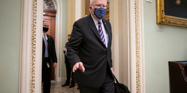 Sen. Patrick Leahy, D-Vt., the president pro tempore of the Senate, arrives at the Capitol in Washington, Tuesday, Jan. 26, 2021.