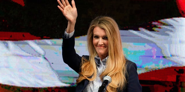 Sen. Kelly Loeffler greets supporters during a Republican election-night watch party, Wednesday, Jan. 6, 2021, in Atlanta. (AP Photo/John Bazemore)