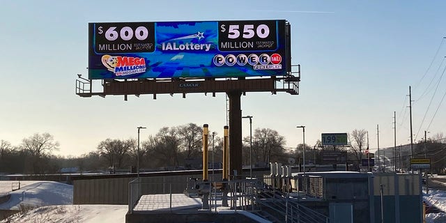 A digital billboard in Des Moines, Iowa, on Jan. 11, 2021, shows jackpots for the Mega Millions and Powerball games.