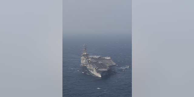 The aircraft carrier USS Nimitz (CVN 68) steams ahead while participating in Malabar 2020 in the North Arabian Sea. (U.S. Navy photo by Mass Communication Specialist 3rd Class Keenan Daniels)