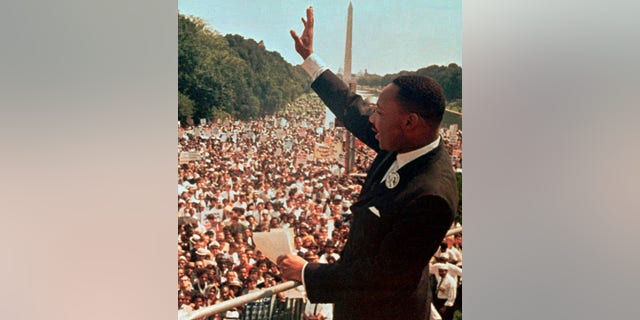 Dr Martin Luther King Jr. thanks the crowd at the Lincoln Memorial for his "I have a dream" speech during the March on Washington, DC, August 28, 1963. (AP Photo)