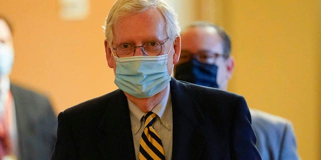 Senate Minority Leader Mitch McConnell of Ky., walks to speak on the Senate floor on Capitol Hill in Washington, Monday, Jan. 25, 2021. (AP Photo/Susan Walsh)