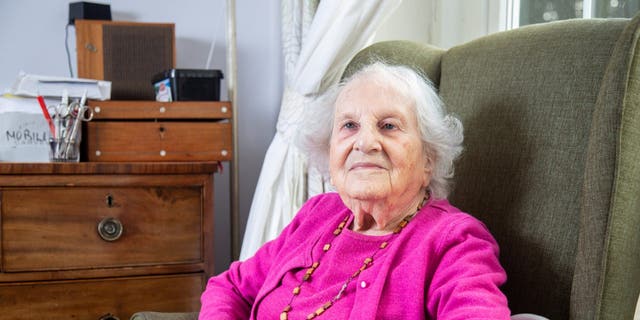 Alice Frank Stock at her care home in Bristol, England. Alice said she would sometimes see Hitler being rushed into the building while flanked by towering SS guards - most likely fearful of an assassination attempt. (Credit: SWNS)