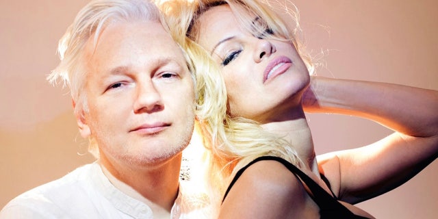 Actress Pamela Anderson and editor of WikiLeaks Julian Assange pose for a portrait on March 12, 2017 in London, England.