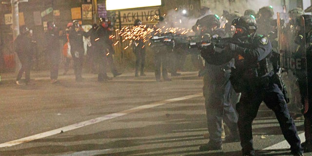 Police fire tear gas at demonstrators during a protest against ICE (Immigration and Customs Enforcement) in Portland, Oregon, United States on Jan. 23, 2021. (Getty Images)