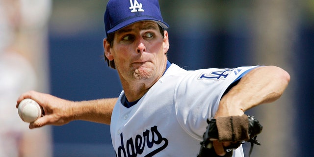 Los Angeles Dodgers p​​itcher Scott Erickson throws to a Los Angeles Angels batter in a baseball game in Los Angeles, April 3, 2005. (Associated Press)