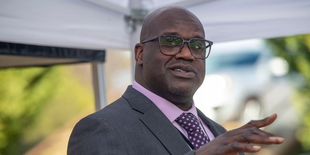 Basketball Hall of Fame Shaquille O'Neal speaks at a press conference in McDonough, Ga. On Friday, January 22, 2021, after being appointed director of community relations for the County Sheriff's Office. 'Henry by Henry County Sheriff Reginald Scandrett.  (Alyssa Pointer / Atlanta Journal-Constitution via AP)