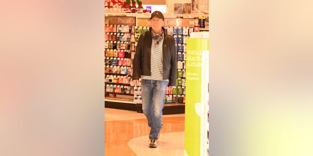 Bruce Willis was photographed at a Rite Aid in Los Angeles after refusing to put on a mask.