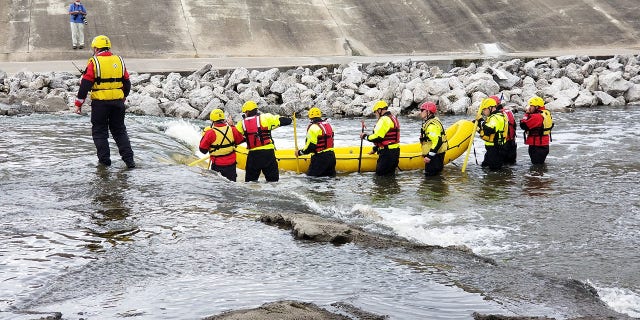 Search efforts were focused on the creek after surveillance video showed the siblings holding hands and walking alone toward the water.