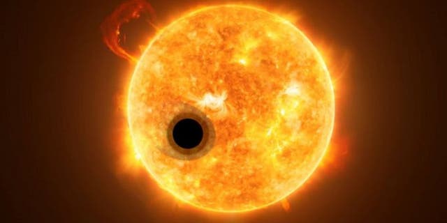 Artistic rendition of the exoplanet WASP-107b and its star, WASP-107. Some of the star's light streams through the exoplanet's extended gas layer. (Credit: ESA/HUBBLE, NASA, M. KORNMESSER)