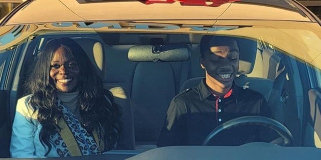 Sutton reacts after stepping into his new car on Thursday.