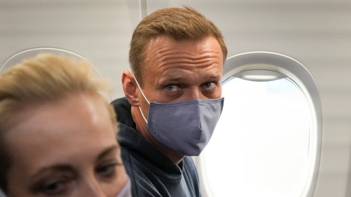 Being Navalny: Russian activist, wife reveal his brush with death