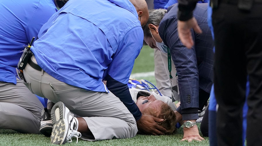 Rams John Wolford taken to hospital after taking pop to the head