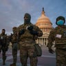 National Guard from Georgia reinforce the security zone on Capitol Hill in Washington, Tuesday, Jan. 19, 2021, before President-elect Joe Biden is sworn in as the 46th president on Wednesday. (AP Photo/J. Scott Applewhite)
