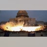 An explosion caused by a police munition is seen while supporters of President Trump gather in front of the U.S. Capitol Building in Washington, D.C., on January 6, 2021.