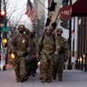 National Guardsmen deploy around the city ahead of President-elect Joe Biden's inauguration ceremony, Tuesday, Jan. 19, 2021, in Washington.