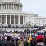 Trump supporters gather outside the Capitol, Wednesday, Jan. 6, 2021, in Washington. As Congress prepares to affirm President-elect Joe Biden's victory, thousands of people have gathered to show their support for President Trump and his claims of election fraud.