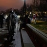 Authorities remove protesters from the U.S. Capitol, Wednesday, Jan. 6, 2021, in Washington.