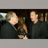 Larry King and actor Tom Hanks arrive at the opening night of Mel Brooks' "The Producers" at the Pantages Theatre on May 29, 2003, in Los Angeles, California. (Photo by Kevin Winter/Getty Images)