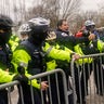 Demonstators loyal to President Trump are sprayed by police, Wednesday, Jan. 6, 2021, during a day of rioting at the Capitol. The mob of protesters descended on Washington, D.C., in an electoral protest, trying to keep President-elect Joe Biden from replacing Trump in the White House.?