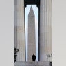 A National Guardsman stands at the Lincoln Memorial as the Washington Memorial looms in the background as security measures are heightened ahead of President-elect Joe Biden's inauguration ceremony, Monday, Jan. 18, 2021, in Washington.