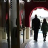 Stand-ins for President-elect Joe Biden and Jill Biden walk to the podium during a rehearsal for the 59th presidential inauguration at the U.S. Capitol in Washington, Monday, Jan. 18, 2021.