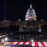 A large flag is placed on the National Mall, with the U.S. Capitol behind it, ahead of the inauguration of President-elect Joe Biden and Vice President-elect Kamala Harris, Monday, Jan. 18, 2021, in Washington.