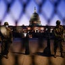 Members of the National Guard gather at the U.S. Capitol as the House of Representatives prepares to begin the voting process on a resolution demanding U.S. Vice President Pence and the cabinet remove President Trump from office, in Washington, D.C., Jan. 12, 2021. (REUTERS/Erin Scott)