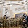 Rep. Brian Mast, R-Fla., gives troops a tour in the Rotunda on Capitol Hill in Washington, Wednesday, Jan. 13, 2021. (AP Photo/Susan Walsh)