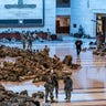Hundreds of National Guard troops hold inside the Capitol Visitor Center to reinforce security at the Capitol in Washington, Wednesday, Jan. 13, 2021. (AP Photo/J. Scott Applewhite