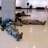Members of the National Guard sleep in the Visitor Center of the U.S. Capitol on Jan. 14, 2021, in Washington, D.C. Security has been increased throughout Washington following the breach of the U.S. Capitol last Wednesday, and leading up to the Presidential Inauguration. (Stefani Reynolds/Getty Images)
