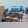 Hundreds of National Guard troops hold inside the Capitol Visitor's Center to reinforce security at the Capitol in Washington, Wednesday, Jan. 13, 2021. The House of Representatives is pursuing an article of impeachment against President Donald Trump for his role in inciting an angry mob to storm the Capitol last week. (AP Photo/J. Scott Applewhite