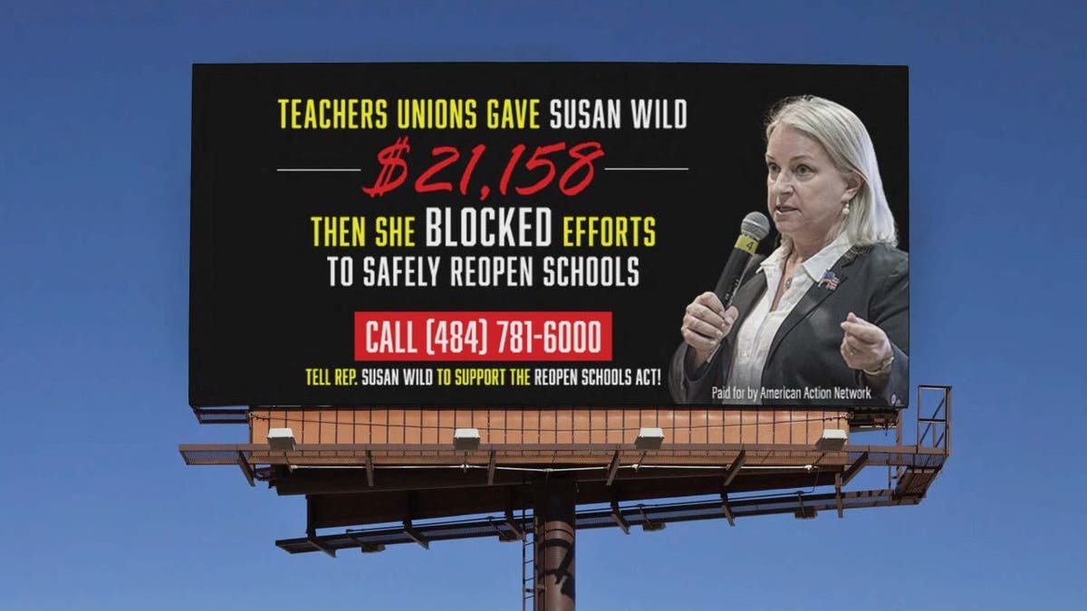 A mockup by the pro-Republican group American Action Network of the billboard that will be seen starting Thursday, Feb. 11, 2021, near a closed school in the district of Democratic Rep. Susan Wild of Pennsylvania.