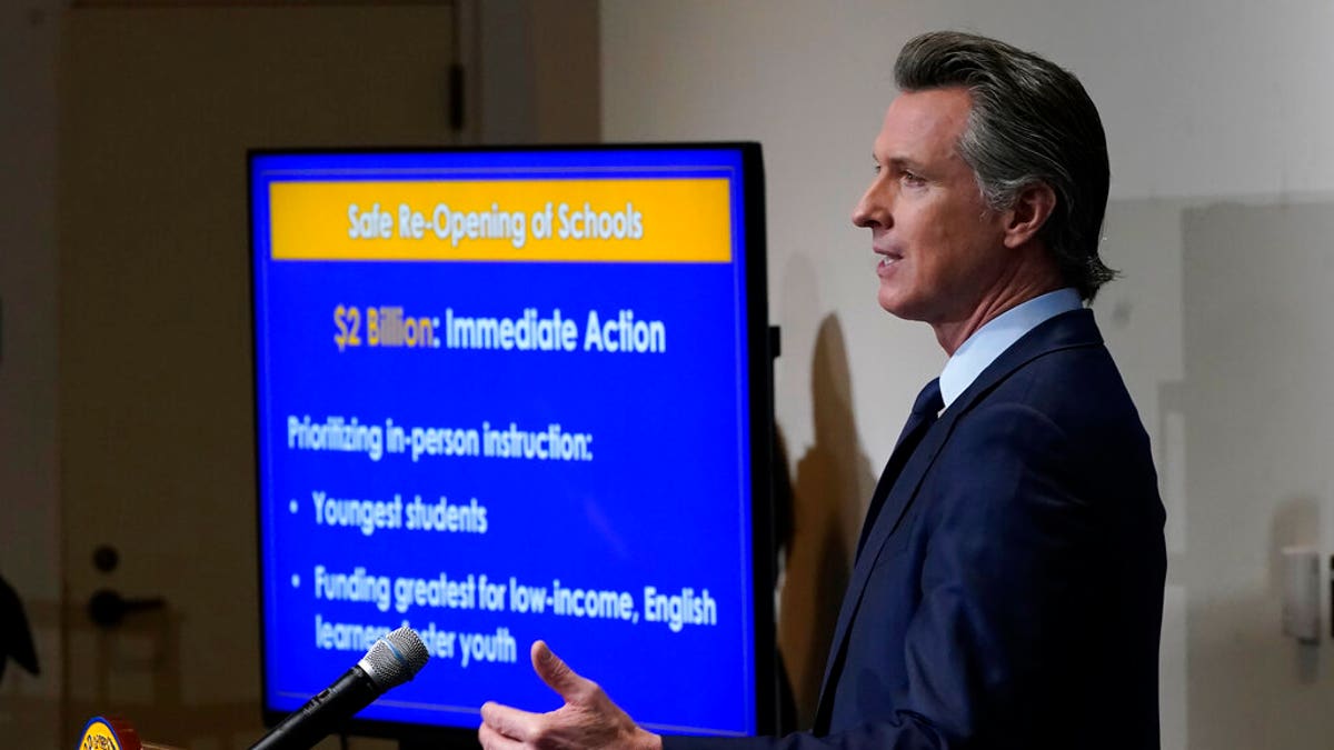 FILE: California Gov. Gavin Newsom outlines the safe re-opening of schools while speaking about his 2021-2022 state budget proposal during a news conference in Sacramento, Calif. 