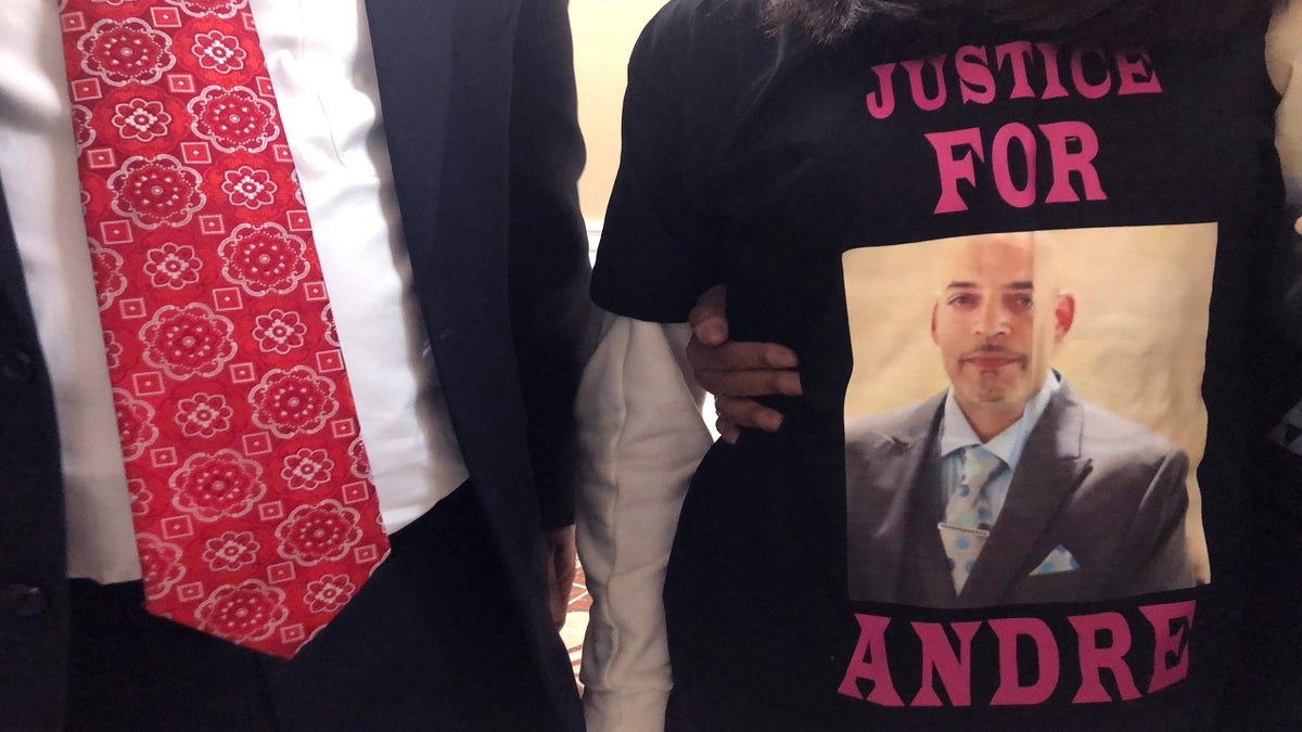 Andre Hill, fatally shot by Columbus police on Dec. 22, is memorialized on a shirt worn by his daughter, Karissa Hill, on Thursday, Dec. 31, 2020, in Columbus, Ohio. (AP Photo/Andrew Welsh-Huggins)