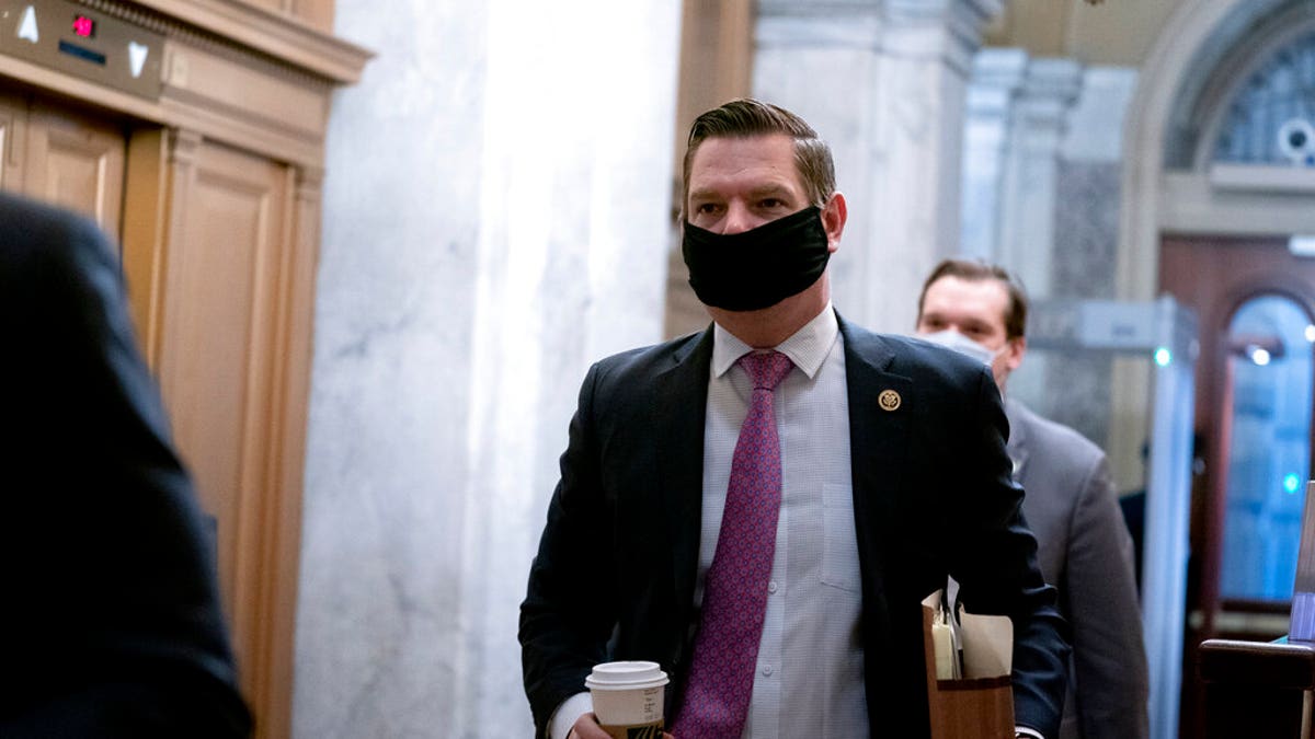 Rep. Eric Swalwell, D-Calif., arrives at the start of the fifth day of the second impeachment trial of former President Trump, Saturday, Feb. 13, 2021 at the Capitol in Washington. (Stefani Reynolds/Pool via AP)