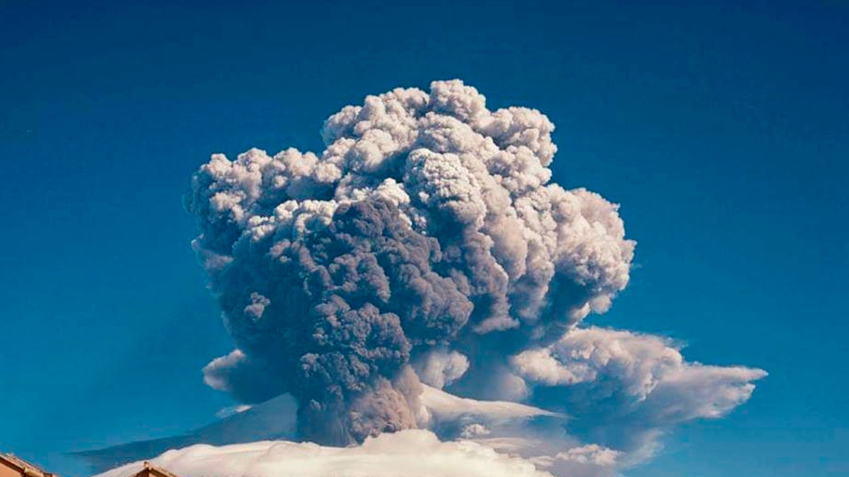 Smoke billows from Mount Etna, Europe’s most active volcano, Tuesday, Feb. 16, 2021. Mount Etna in Sicily, southern Italy, has roared back into spectacular volcanic action, sending up plumes of ash and spewing lava. (Davide Anastasi/LaPresse via AP)