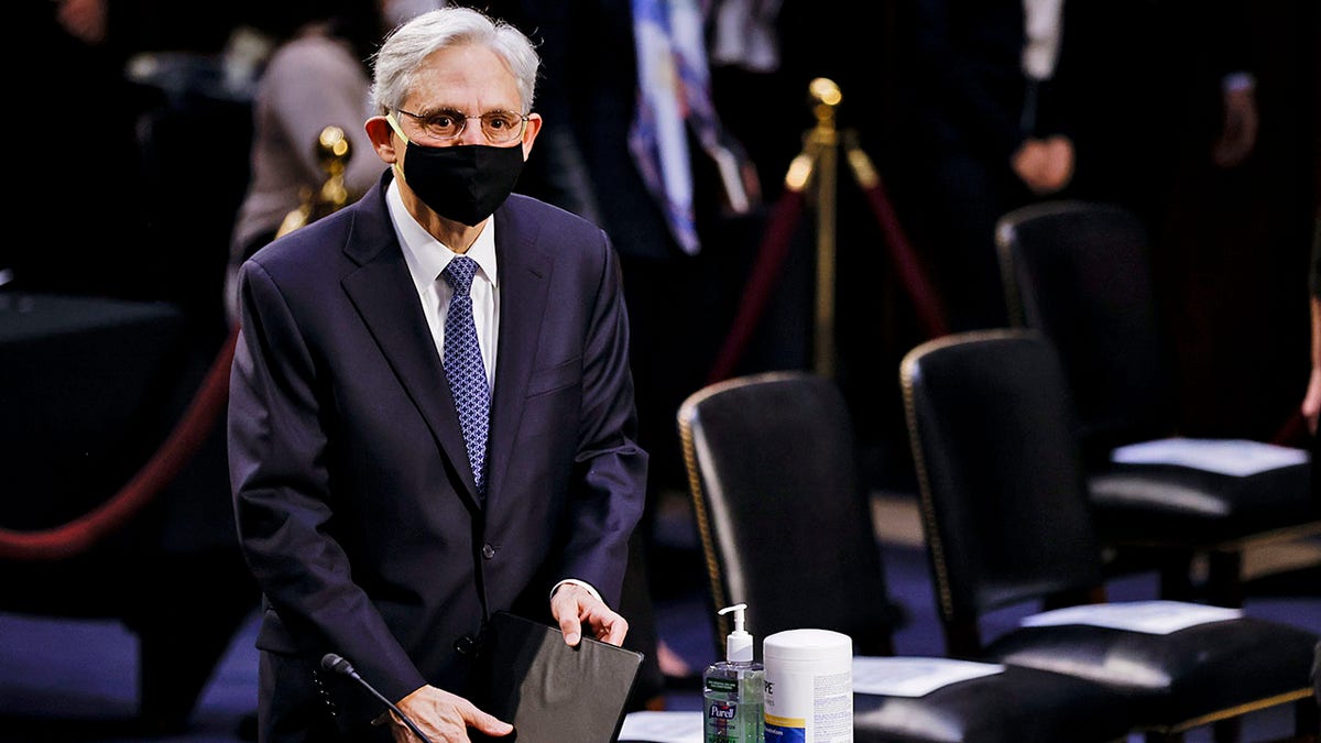 Judge Merrick Garland arrives to testify before a Senate Judiciary Committee hearing on his nomination to be U.S. Attorney General, Monday, Feb. 22, 2021 on Capitol Hill in Washington. (Carlos Barria/Pool via AP)