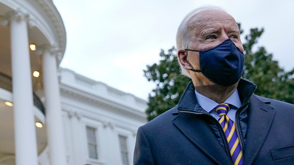 President Joe Biden walks on the South Lawn of the White House to board Marine One after speaking with reporters, Tuesday, Feb. 16, 2021, in Washington. Biden is traveling to Milwaukee to participate in a town hall event.