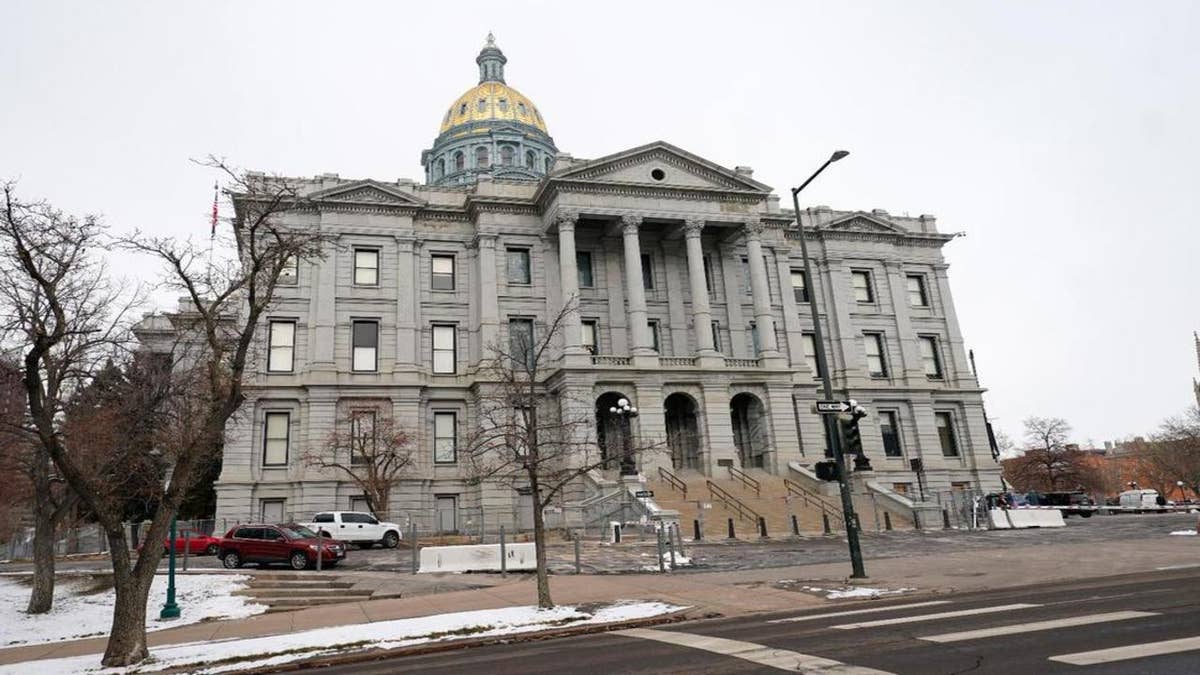 FILE—The State Capitol is shown in this file photograph taken Monday, Dec. 14, 2020, in downtown Denver. (AP Photo/David Zalubowski, File)