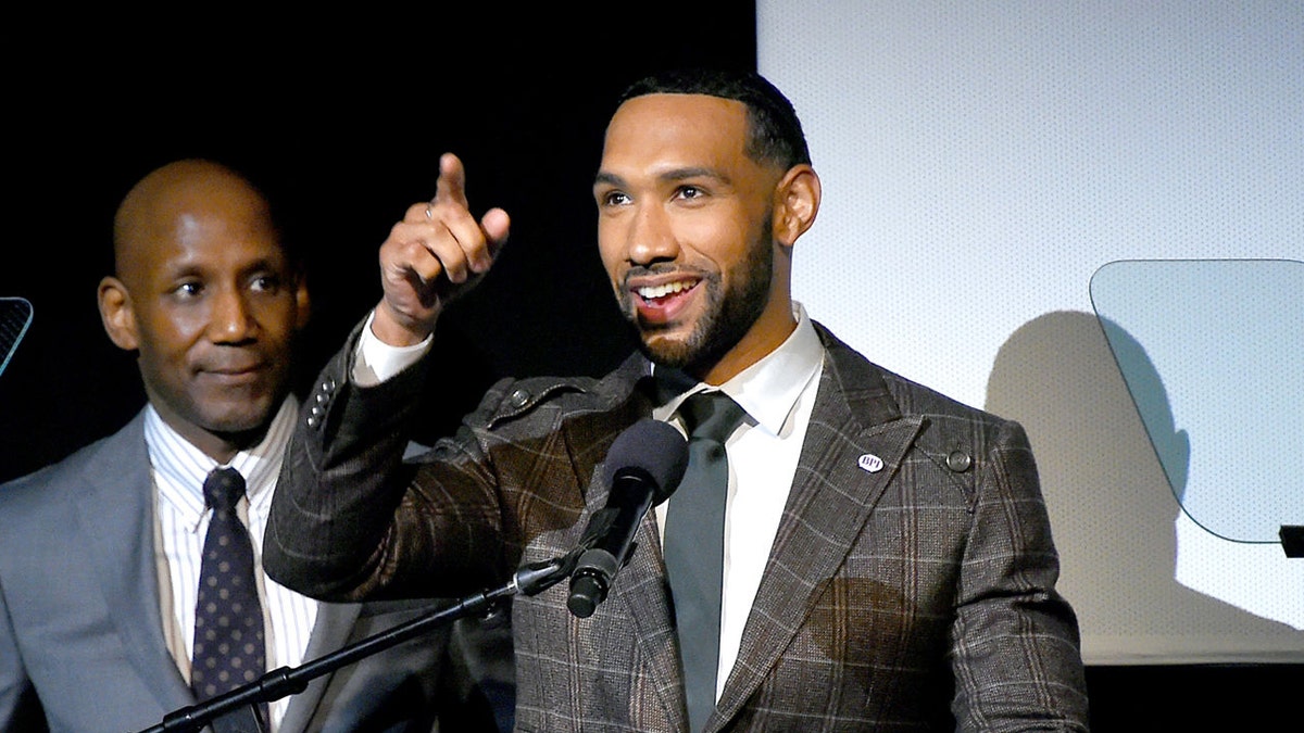 Craig Steven Wilder and Dyjuan Tatro speak on stage at the special screening of COLLEGE BEHIND BARS at The Apollo Theater on November 12, 2019 in New York City. (Photo by Ben Gabbe/Getty Images for Skiff Mountain Films)