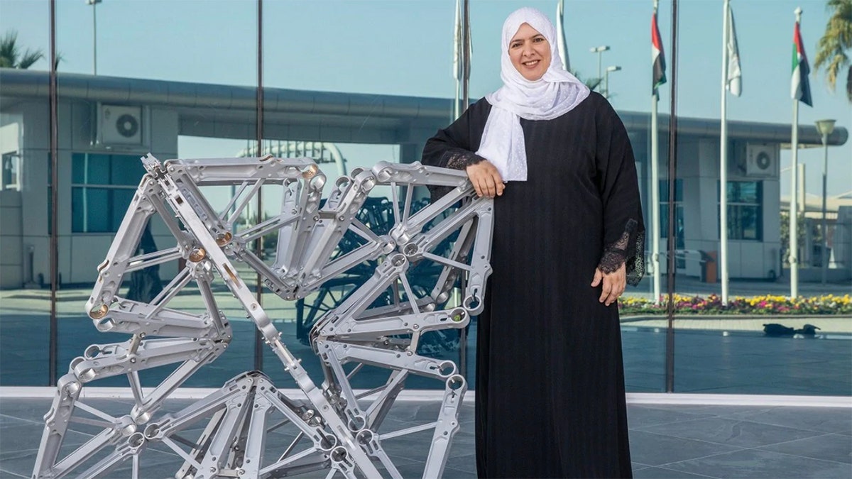 Etihad Airways has partnered with two artists to upcycle old plane parts into art installations at the airline's Abu Dhabi headquarters. Azza Al Qubaisi is pictured with her sculpture.