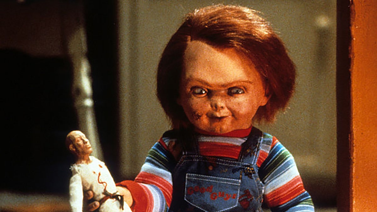 Chucky with doll in a scene from the film 'Child's Play', 1988. (Photo by United Artists/Getty Images)